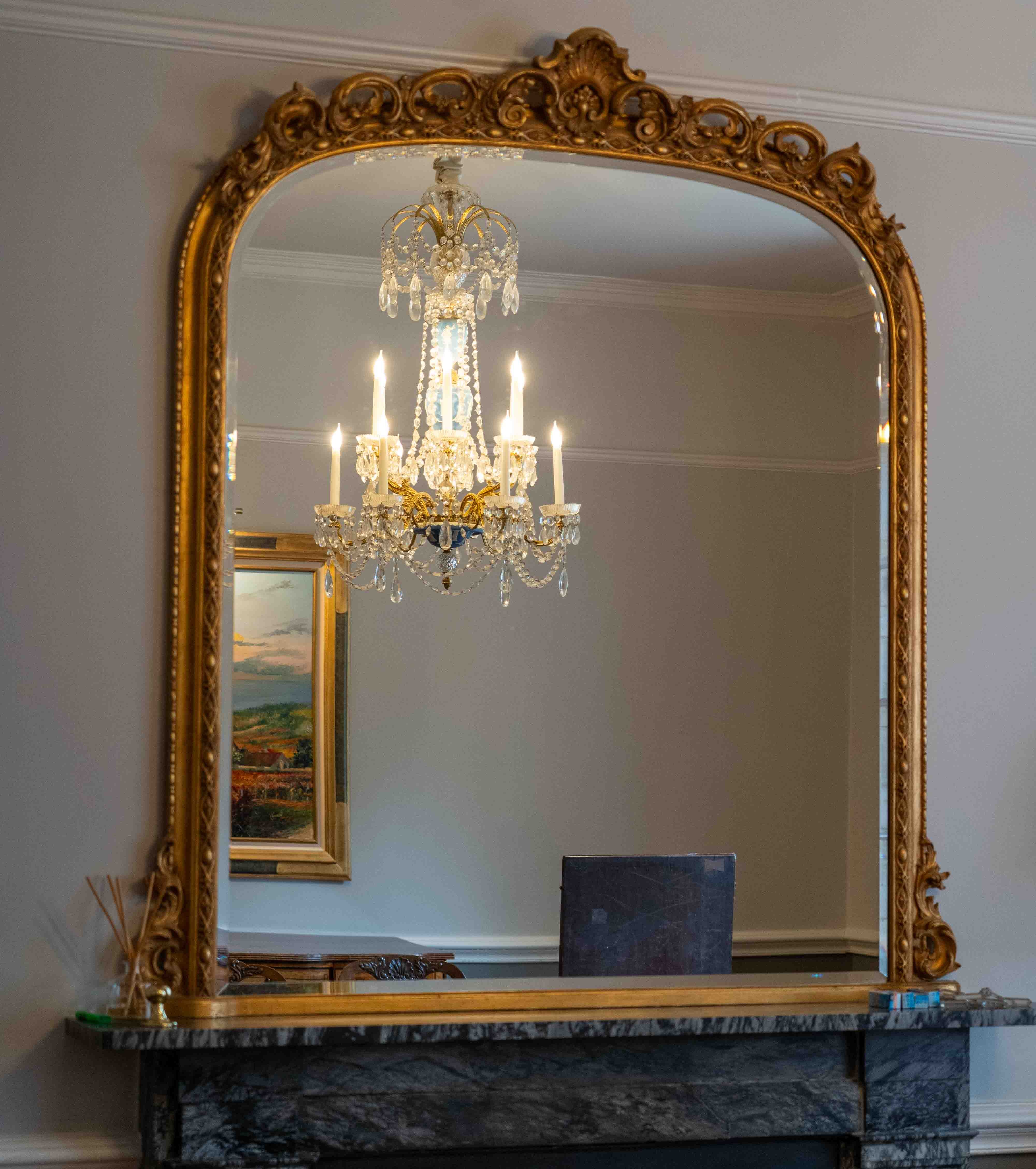 A Victorian style giltwood and composition overmantel mirror, width 140cm, height 164cm. Condition - good